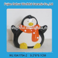 Bocal promotionnel en céramique épicée avec figurine pingouin
